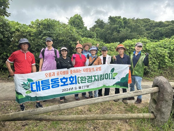 지난 17일 수산2리 주민들이 환경지킴이 활동에 나섰다.